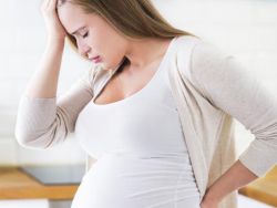 Поглъщане на ниско гърба по време на бременност през първия триместър