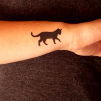 co oznacza tatuaż kota