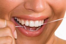 как чистить зубы зубной нитью