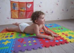 развиване на пъзел с килими