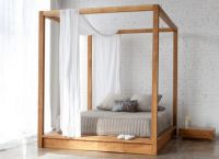 manželská postel z masivního dřeva