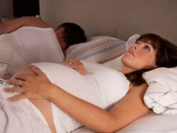 težo v trebuhu v zgodnji nosečnosti