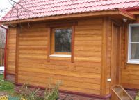 Покриване на дървена къща имитация на дървен материал -1
