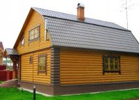 Obejmujący drewniany dom blokowy -3
