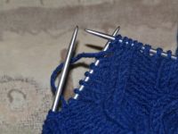 как да вратите капачката на човека с игли за плетене 10