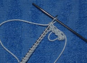 Kako vezati nogavice s iglom za pletenje 19