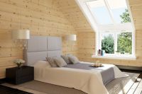 wnętrze sypialni w drewnianym domu 7