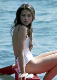 Орнелла Мути в белом купальнике в одном из фильмов