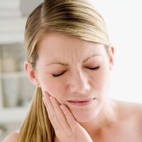 znaki periodontitisa