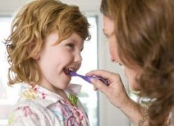 Kako otroka očistiti zobe